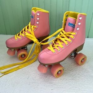 Pink and Yellow Impala Quad Skates
